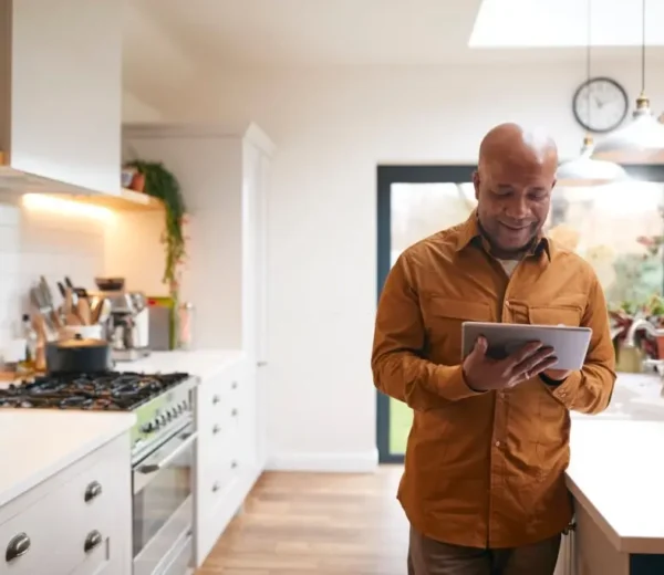 privacy policy bluedot cares home care north carolina cleveland ohio elderly black man on ipad